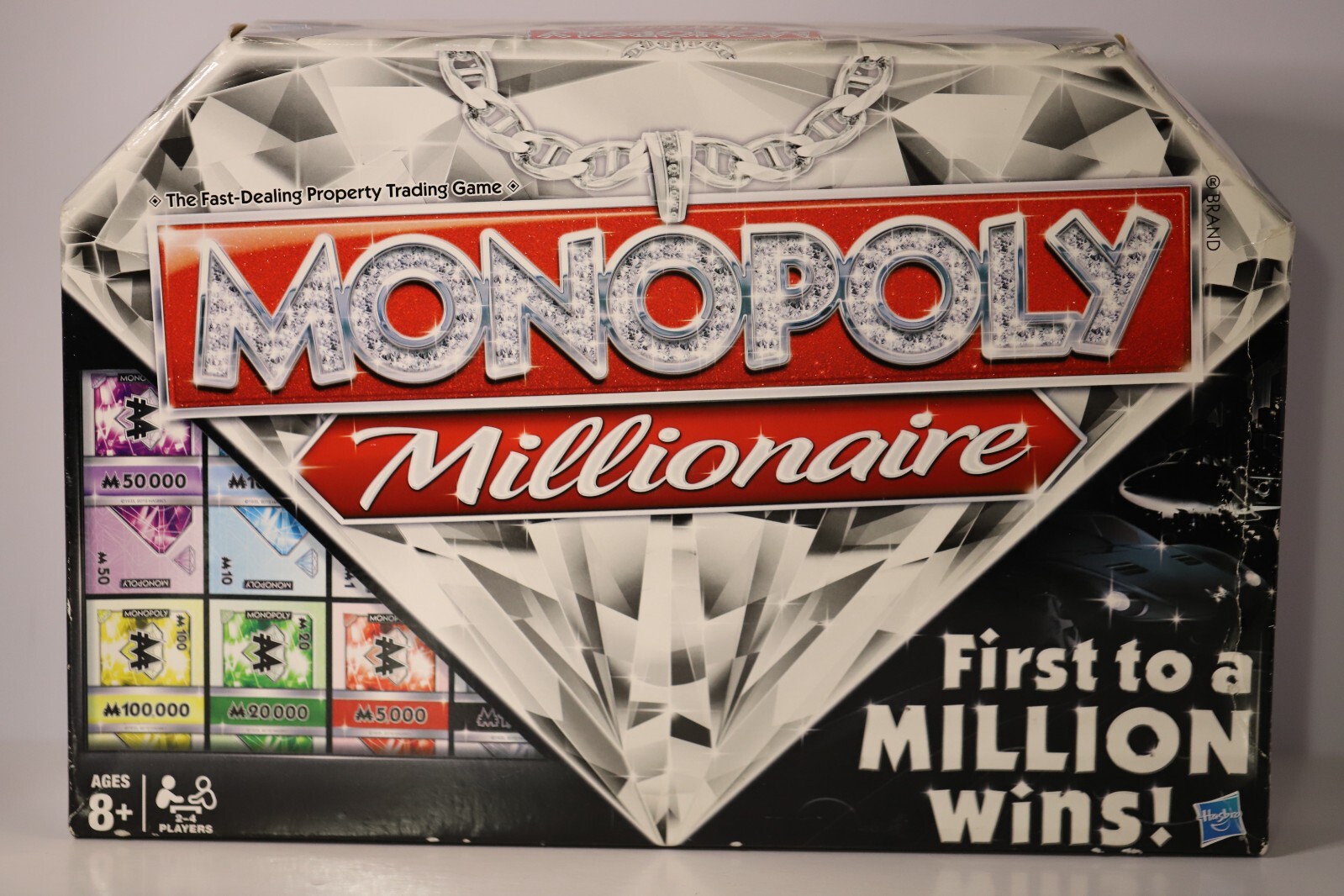 Monopoly: Millionaire Edition Board Game – First to a Million Wins Luxury Theme