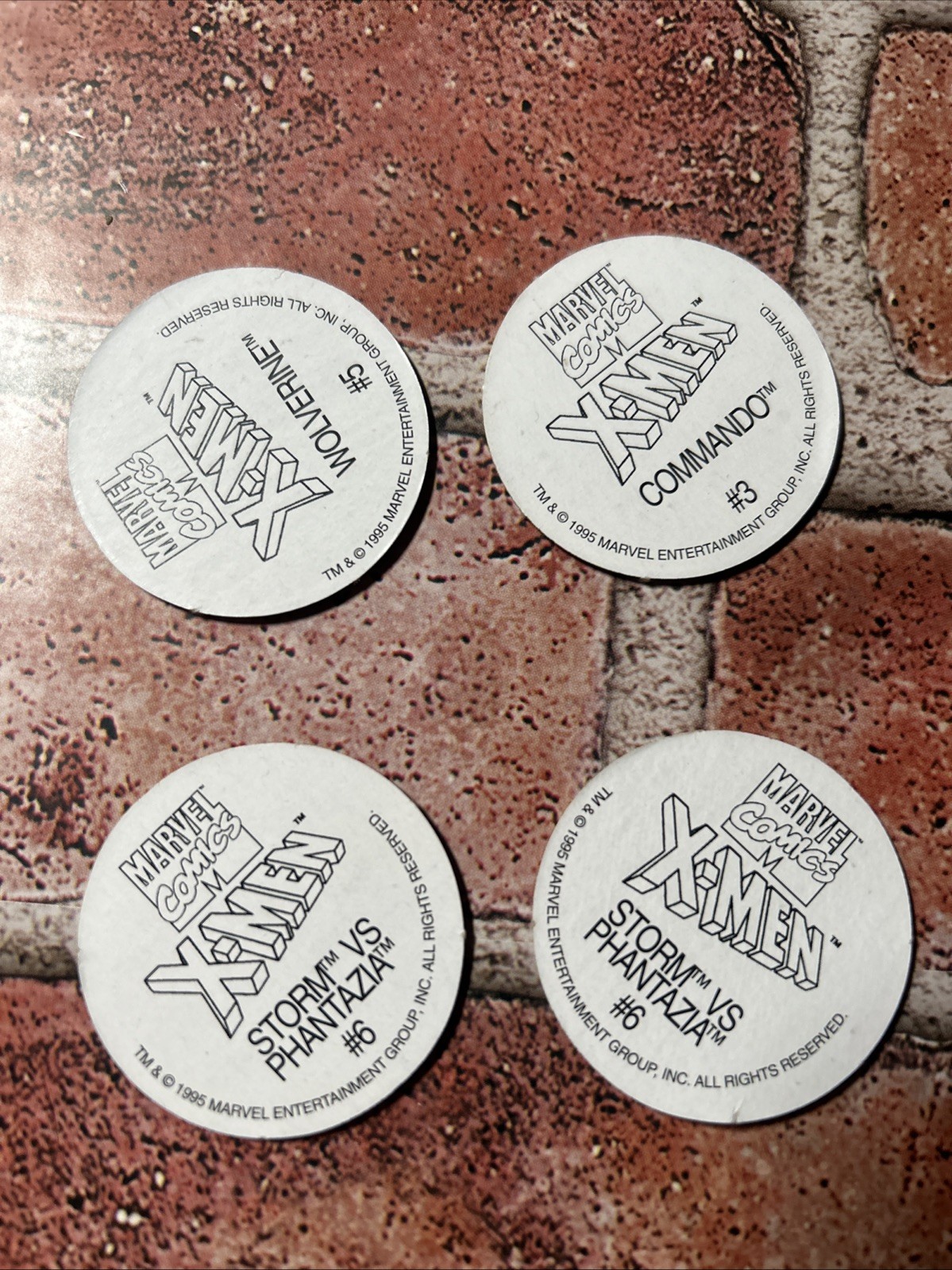4 – Marvel Comics X-Men 1995 Pogs Wolverine Commando Storm VS Phantazia