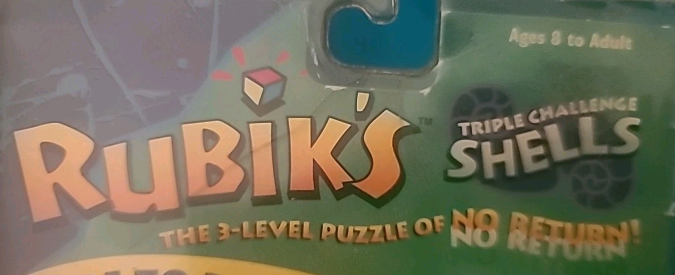 NIP 2000 Hasbro – RUBIKS TRIPLE CHALLENGE SHELLS Hand Held Game – Hard to Find