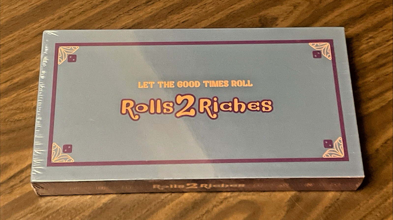 Rolls 2 Riches – Let the Good Times Roll | 4-6 players | +7 {NEW SEALED SHRINK}