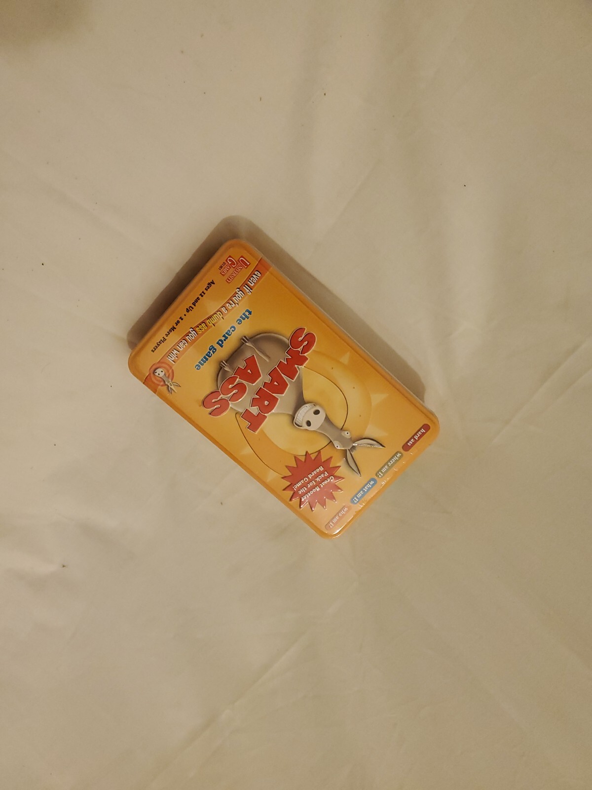 Smart Ass The Card Game Booster Pack Tin – Family Fun