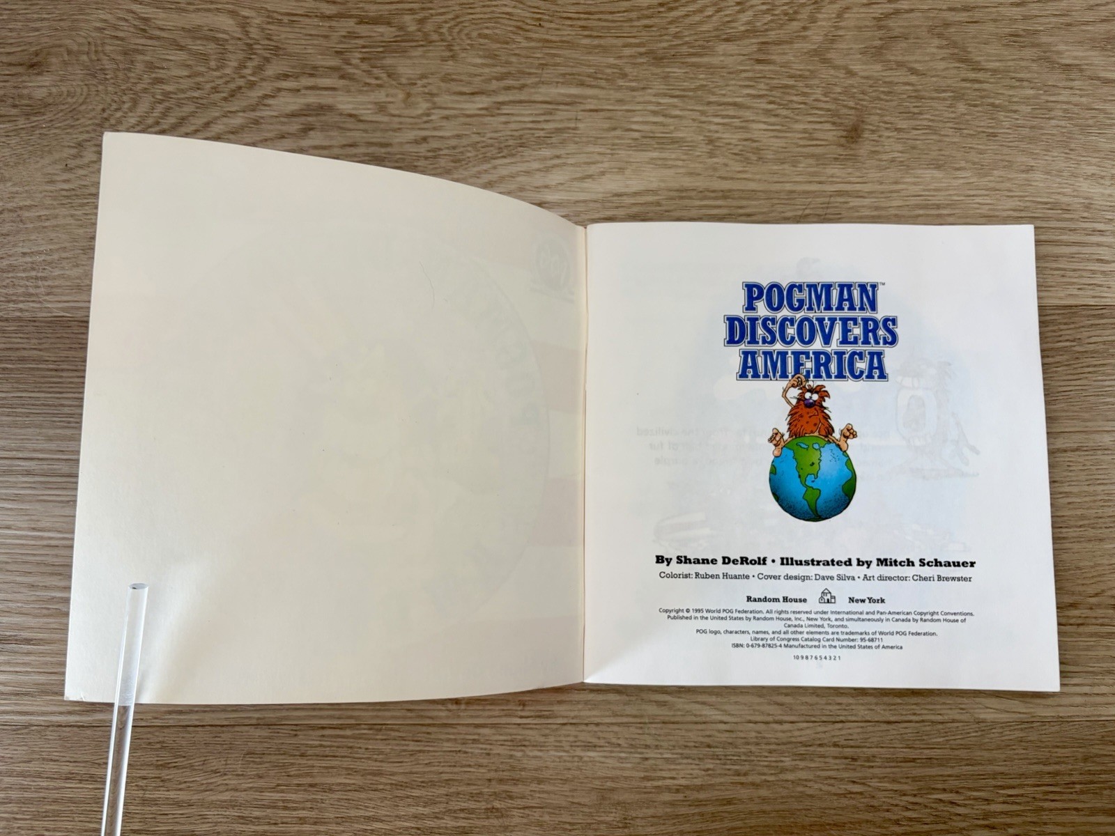 Pogman Discovers America Book and 20 Pogs Unpunched AND IN BOOK PB