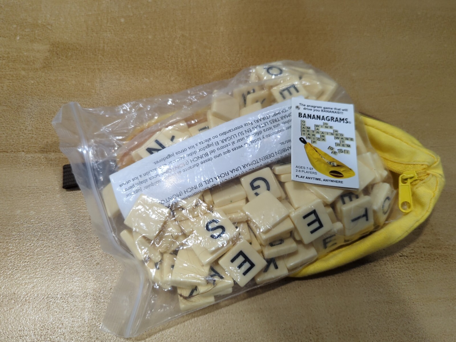 Bananagrams Crossword Family Fun Game Word Play Tiles in Banana Bag, Complete