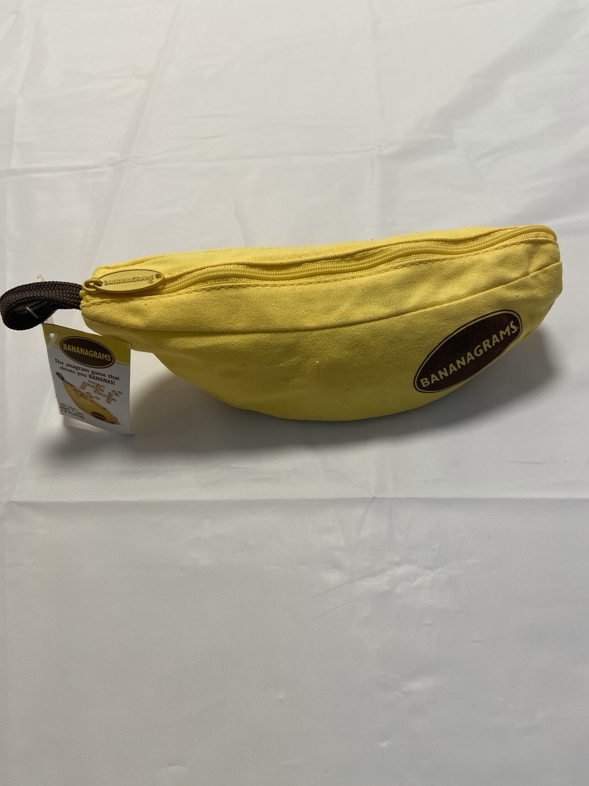 Bananagrams Family Fun Word Game NEW NWT – Portable Travel Pouch – 1-8 Players