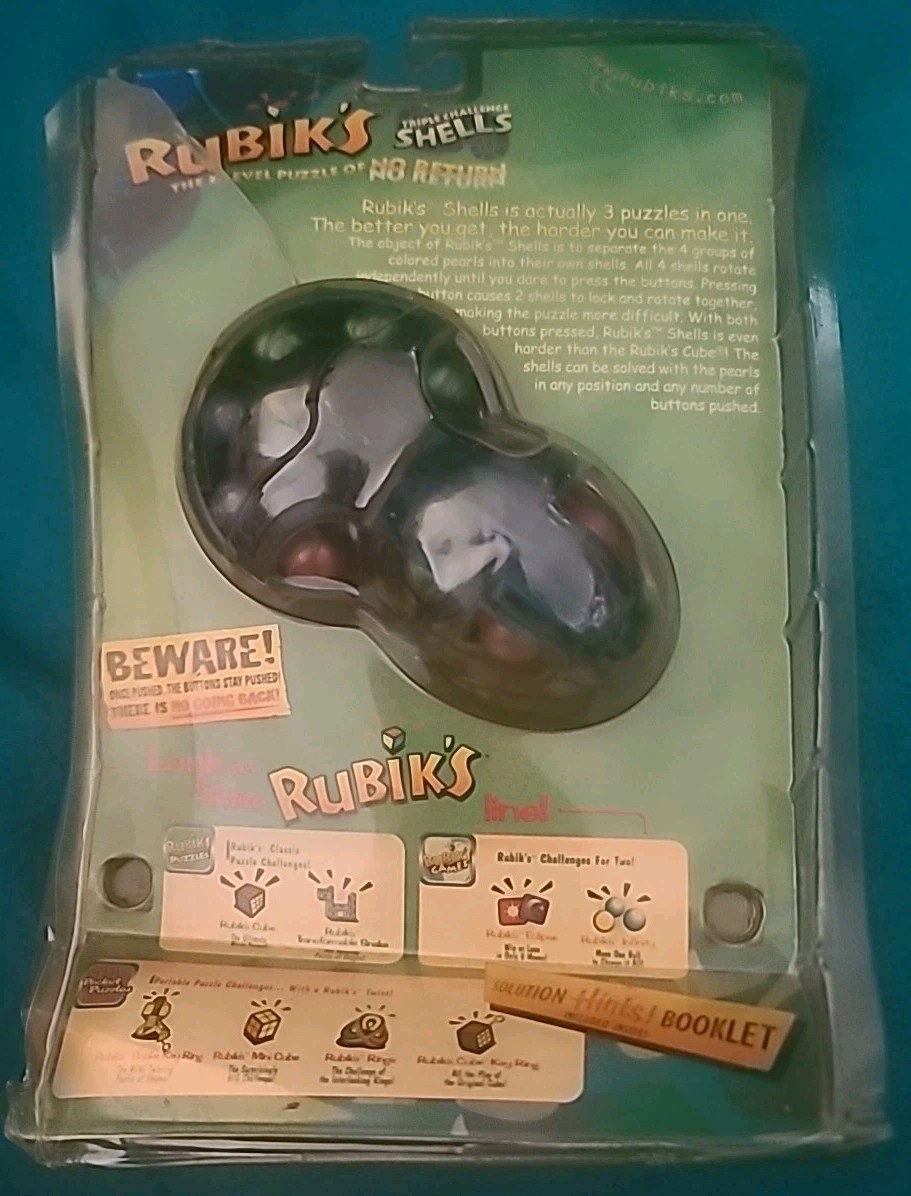 NIP 2000 Hasbro – RUBIKS TRIPLE CHALLENGE SHELLS Hand Held Game – Hard to Find