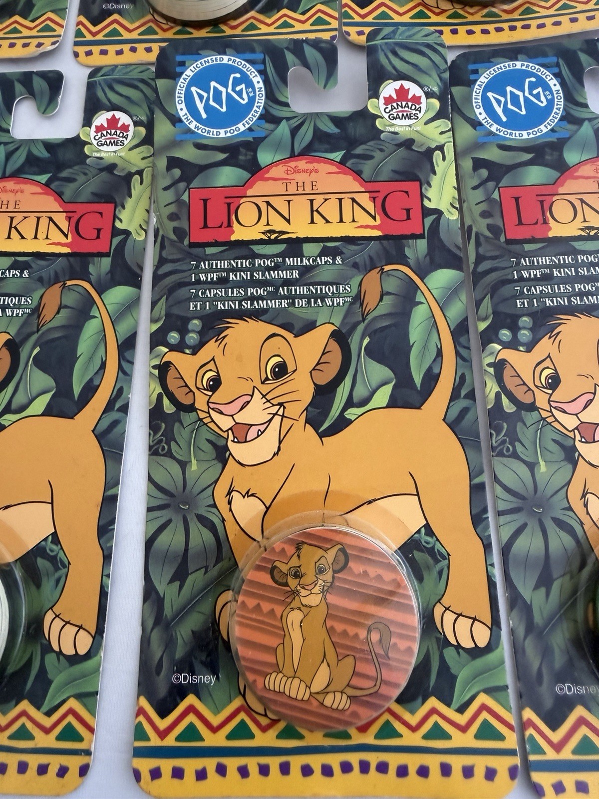 The World Pog Federation Lot of 7 The Lion King Carded Pogs with Slammer New
