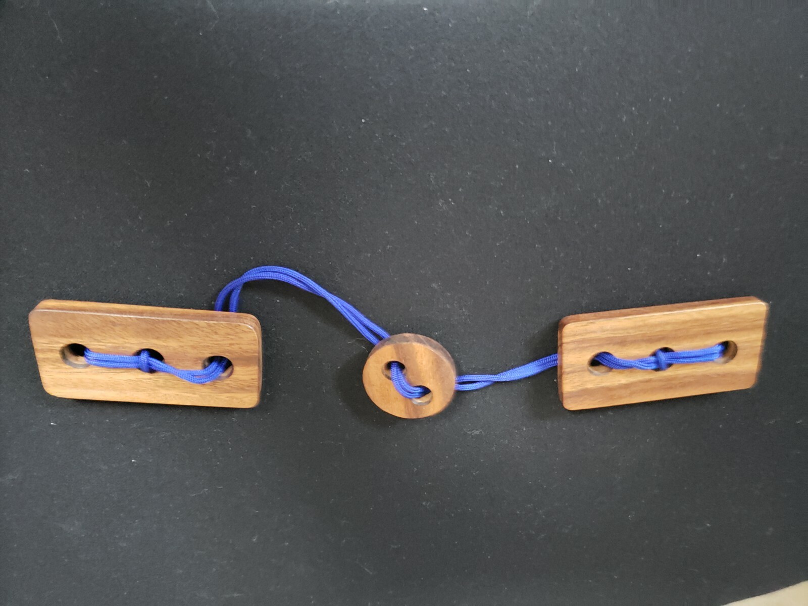 Victoria String Puzzle, made from Monkey Pod Wood from Thailand