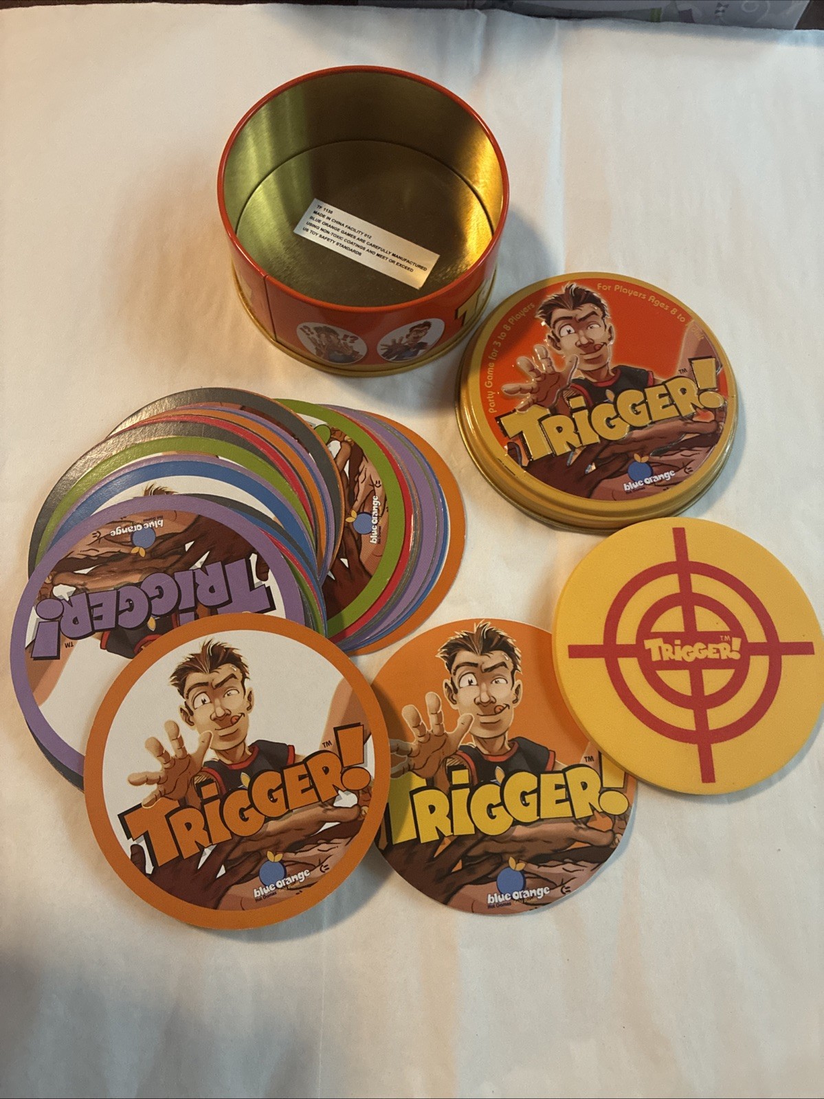 TRIGGER Family Friendly Fun Party Game in Collectible Tin Container Complete