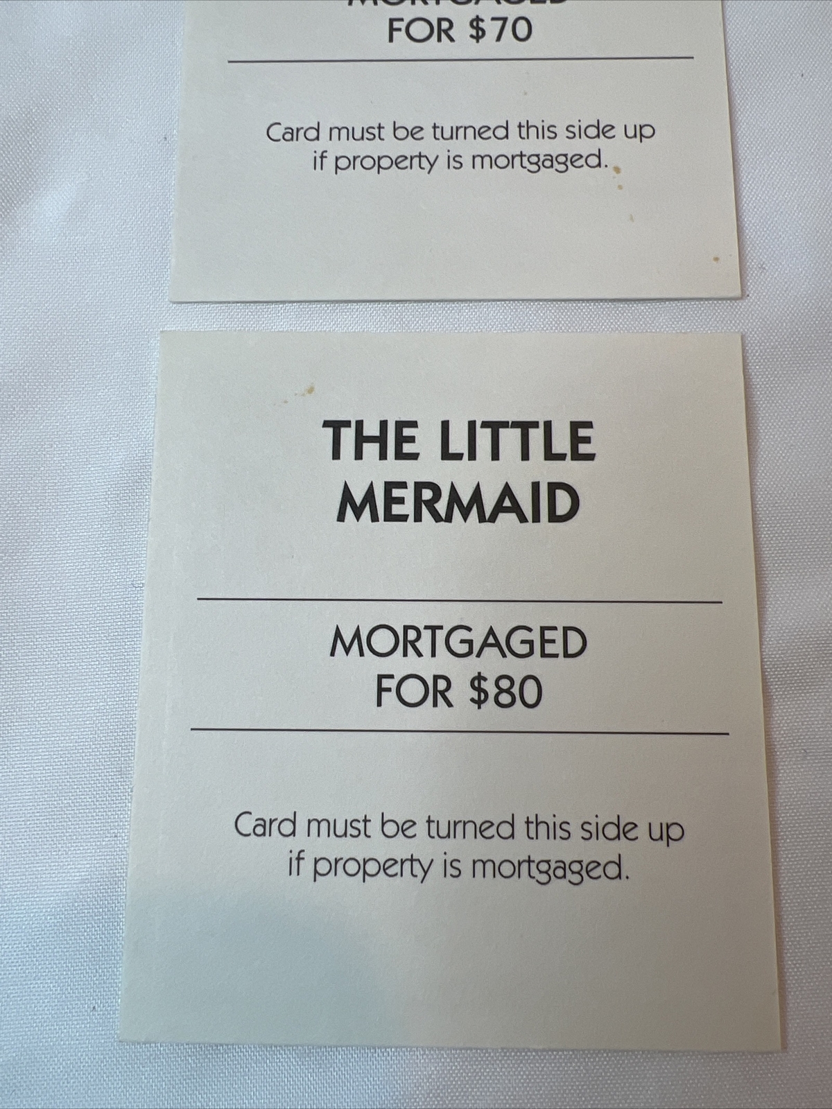 2 Light Purple Properties Monopoly 2001 Disney Edition Parker Brothers Game