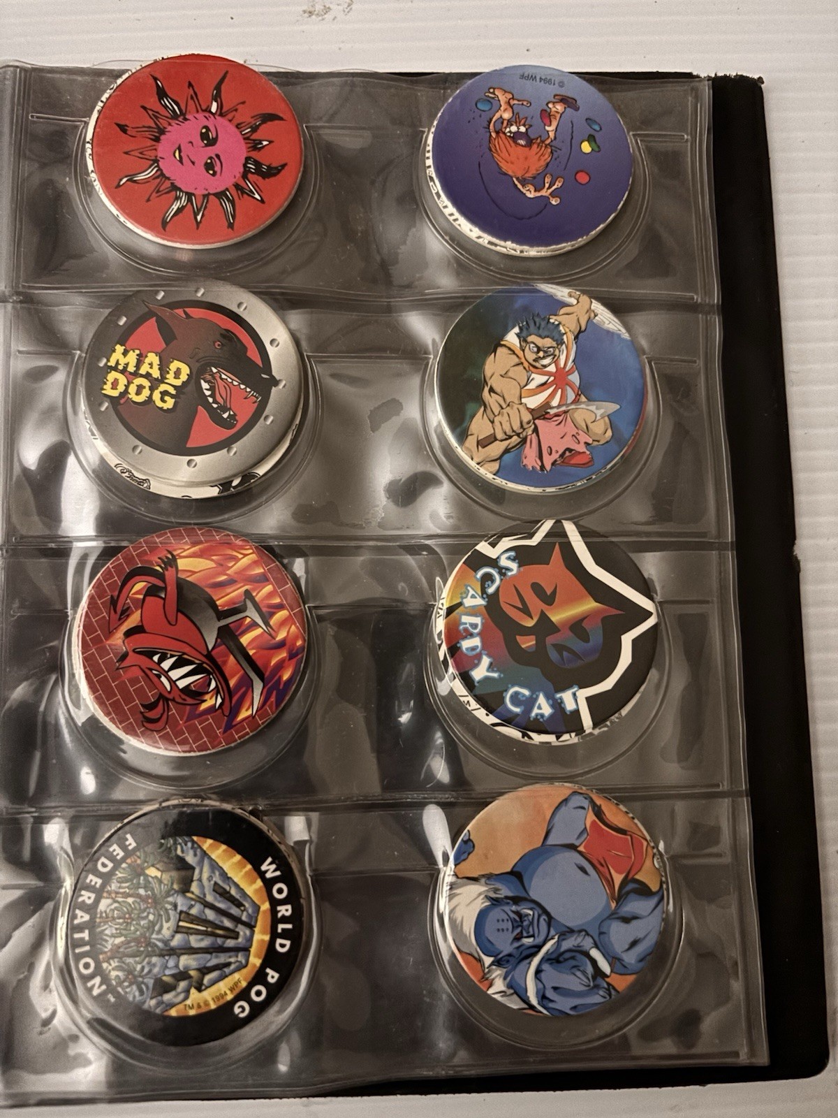 8 Page Pog Cap Album With 118 Pogs