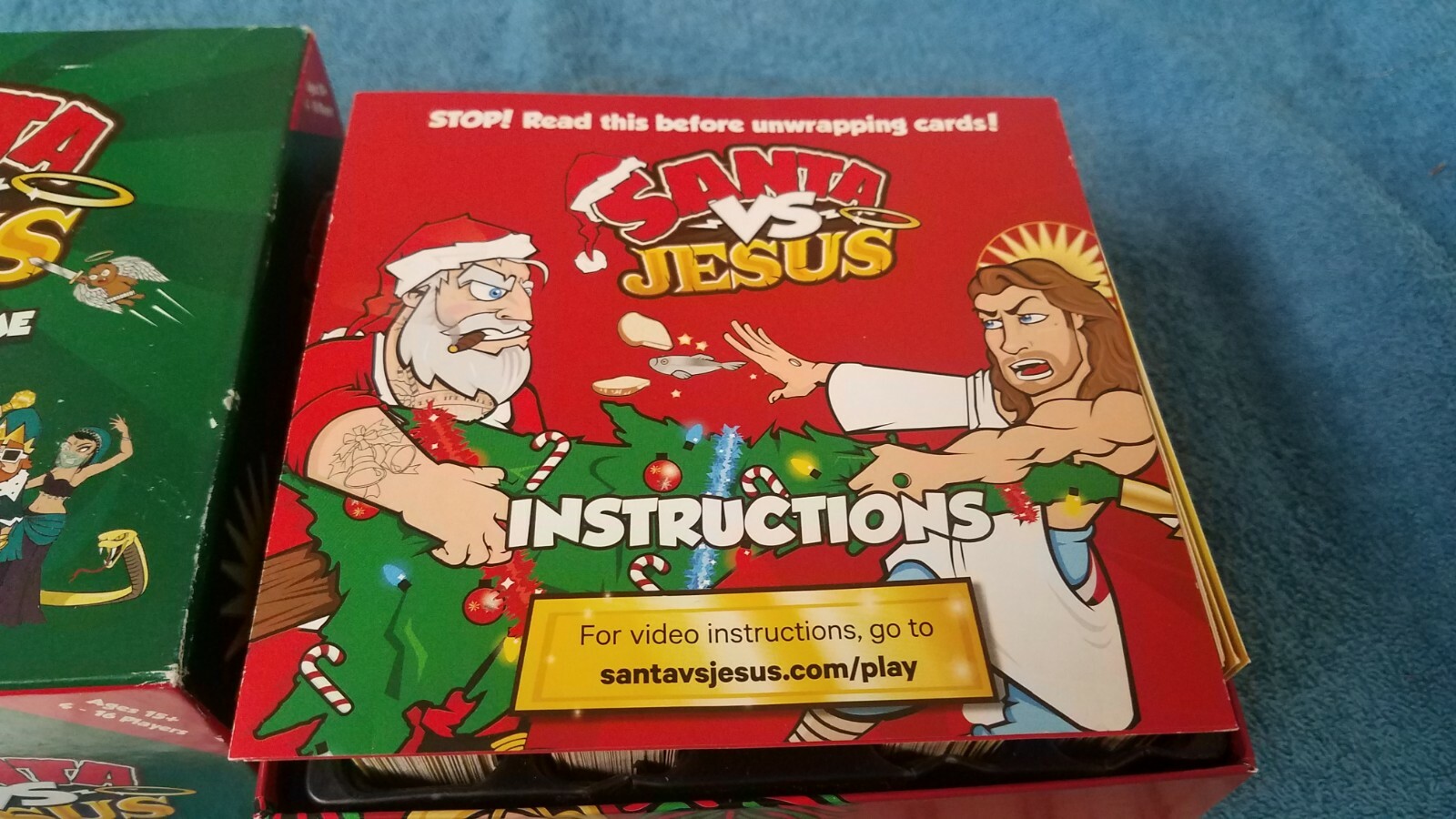 Santa VS Jesus The Epic Party Game 4-16 Players Komo Games Complete