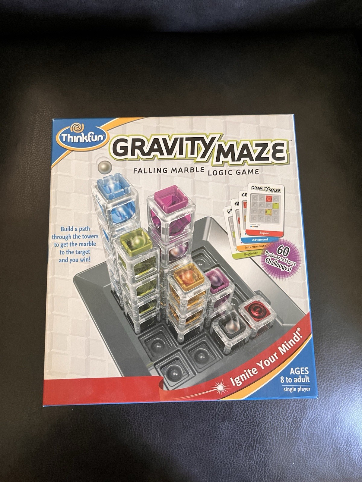 THINK FUN GRAVITY MAZE GAME FALLING MARBLE AGES 8 TO ADULT ignite your mind!