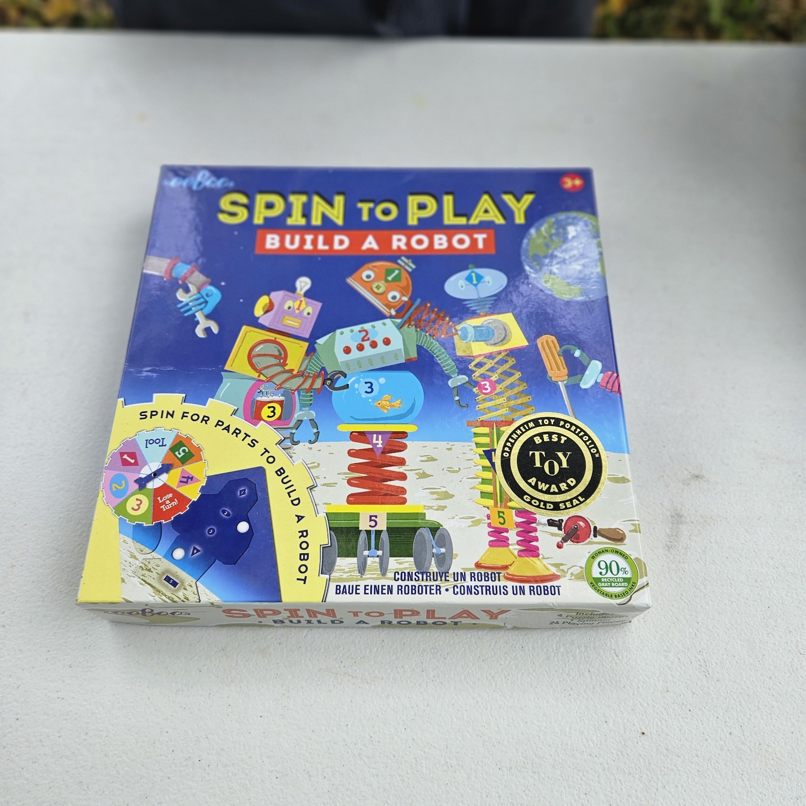 Saxton Fre 2008 EeBoo Spin-to-Play BUILD A ROBOT Puzzle Spinner Game NEW