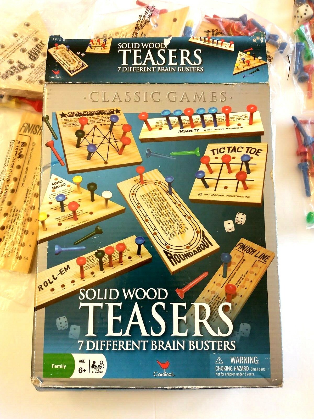 Cardinal Solid Wood Teasers Game 7 Different Brain Busters Games in Box