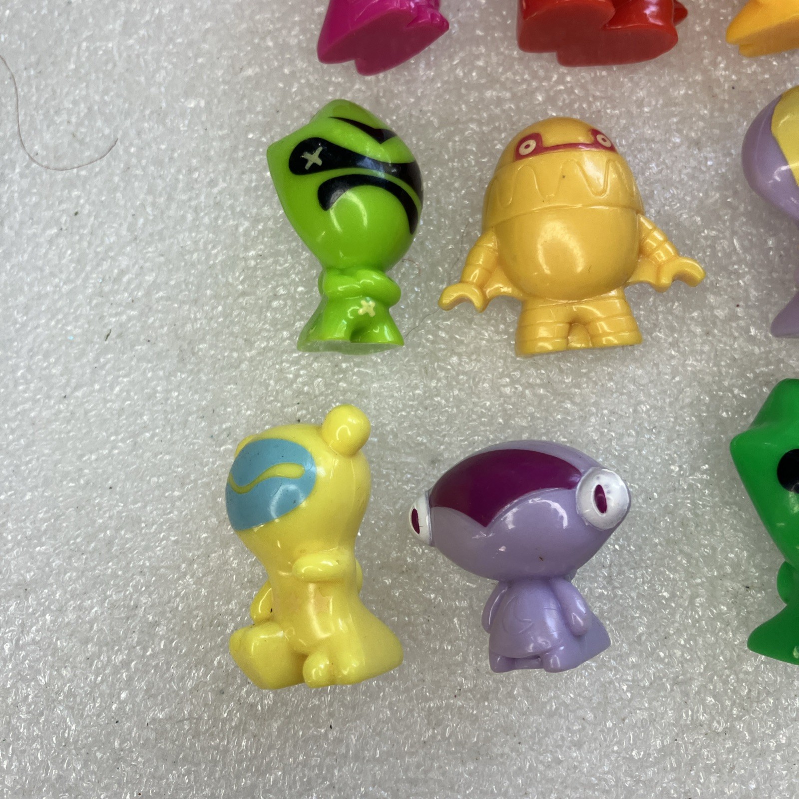 Lot of 20 Gogos Crazy Bones Figures As Shown