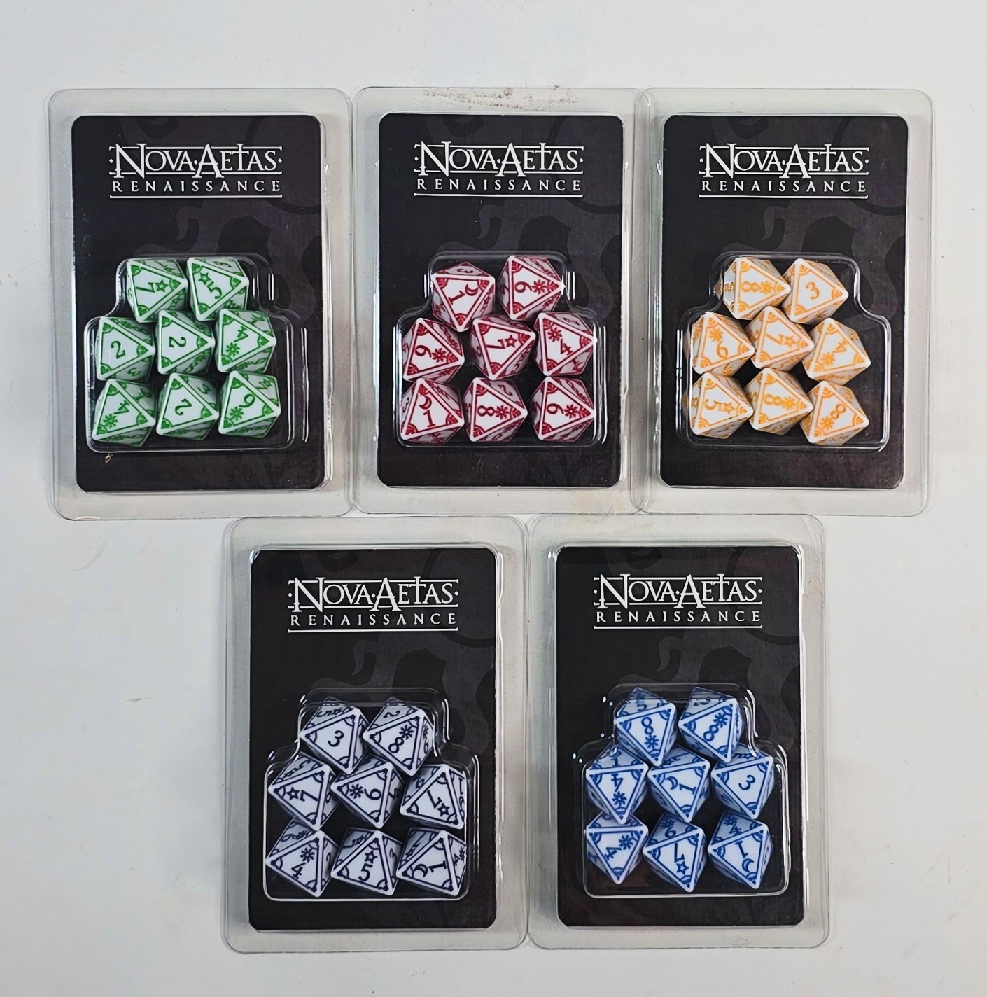 Nova Aetas Renaissance: Dice Set (Blue, Yellow, Red, Green, Purple) – SEALED