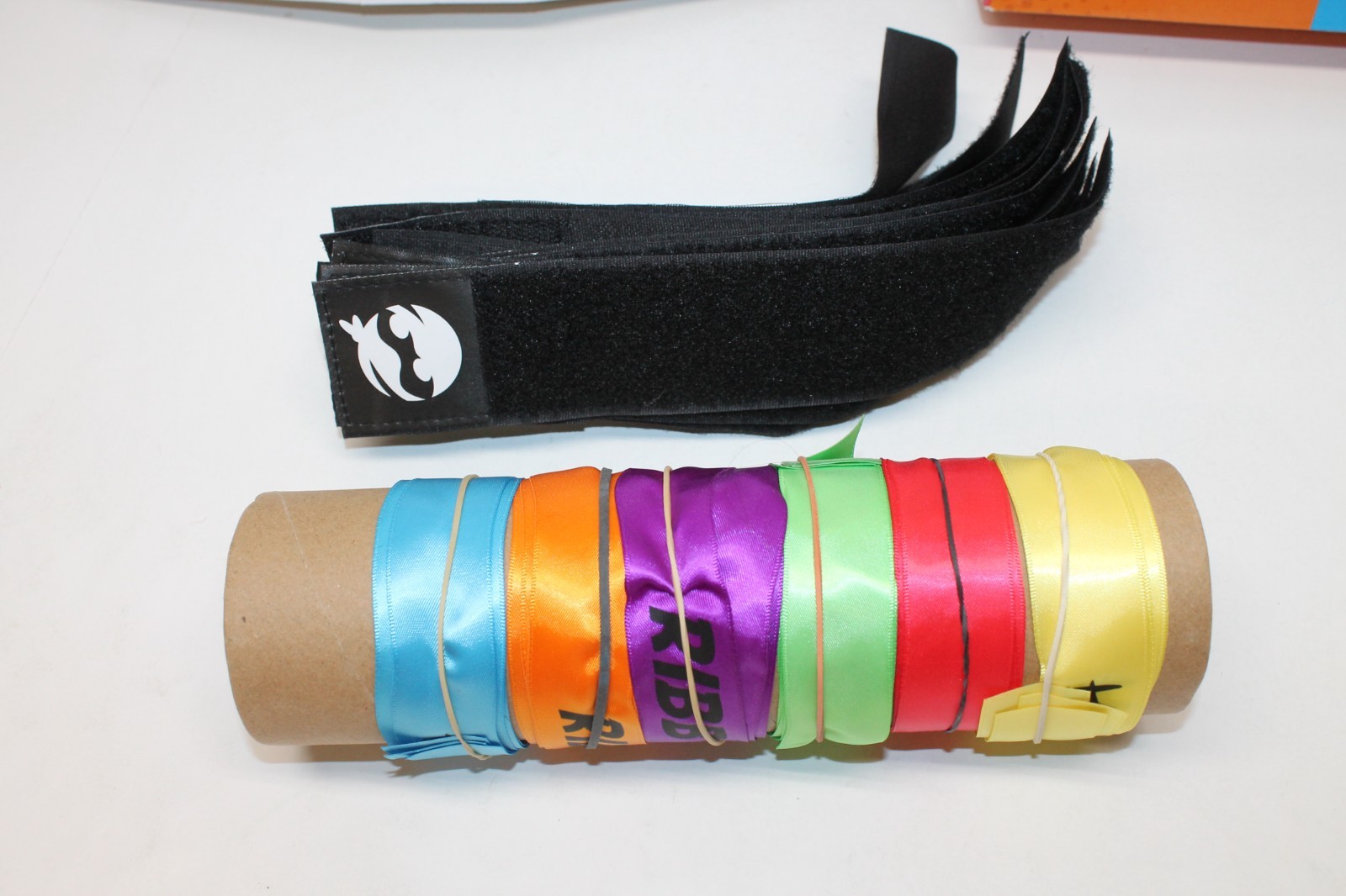 Ribbon Ninja Game Fat Brain Toy Company Ages 6 – 14; 12 wrist bands, 18 ribbons