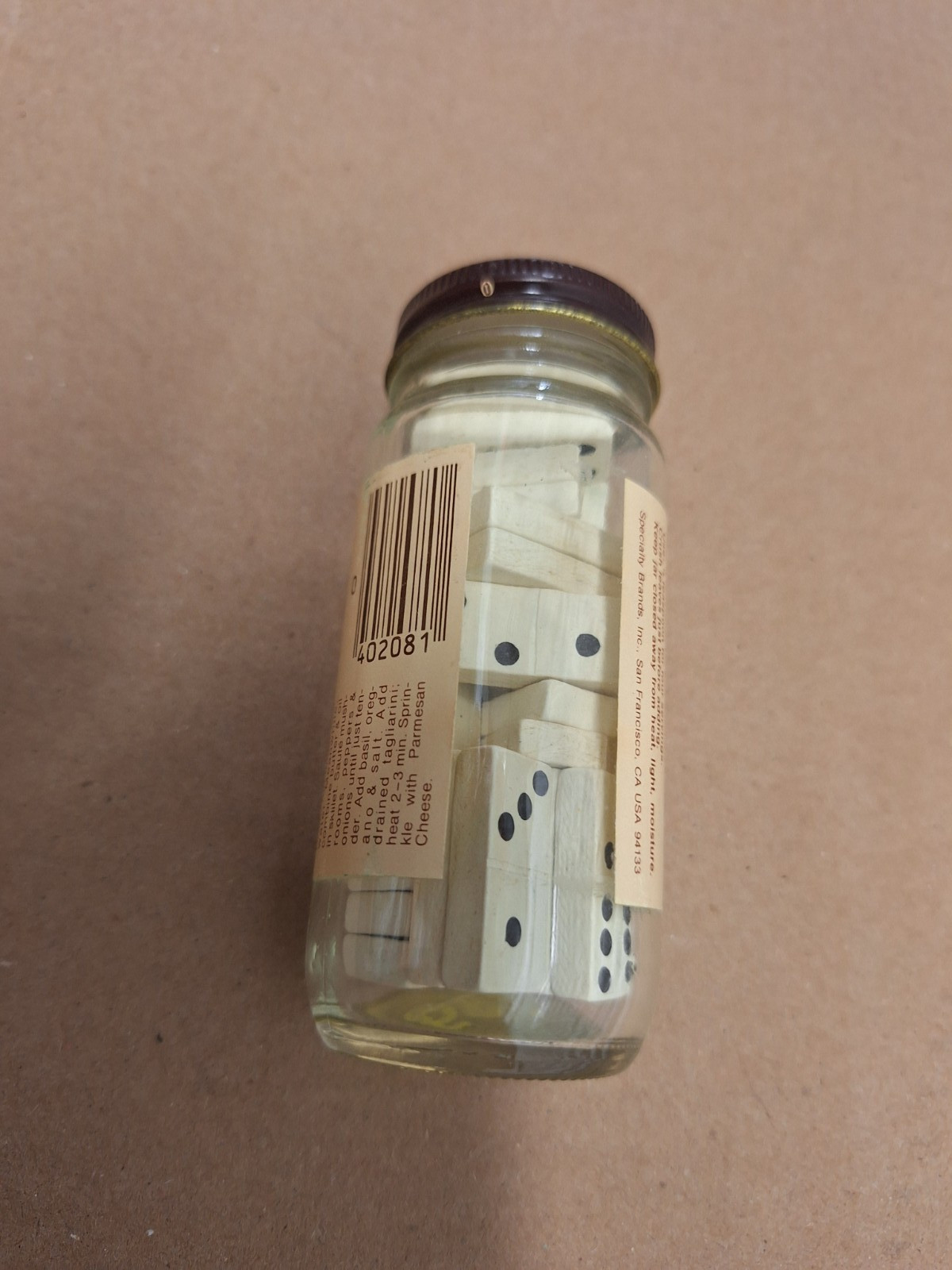 Set of small dominoes: entire set fits inside spice jar; excellent condition