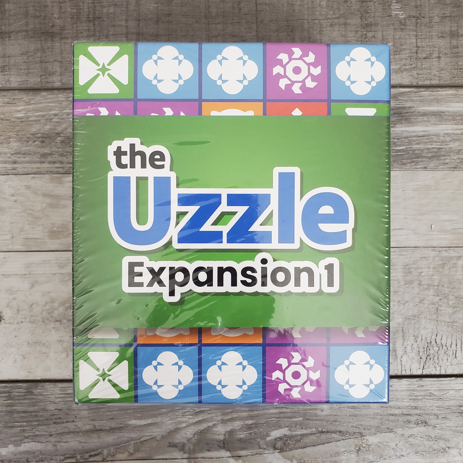 The Uzzle Board Game and Uzzle Expansion 1
