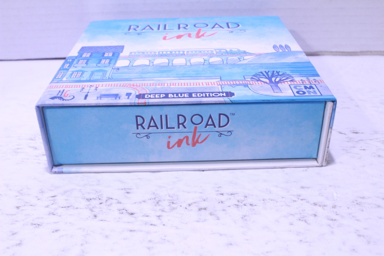 Railroad Ink: Deep Blue Edition Board Game by CMON – Family Strategy Fun