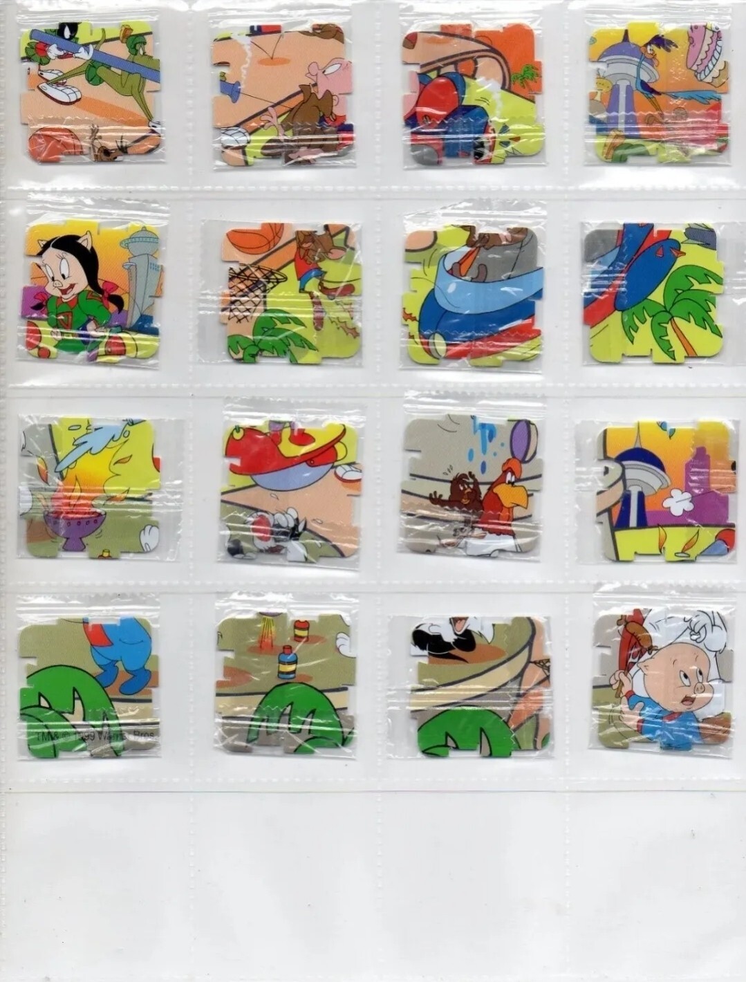 Walkers Looney Tunes Qubix Tazos – Complete set of 36 Tazos – year 2000 Sealed