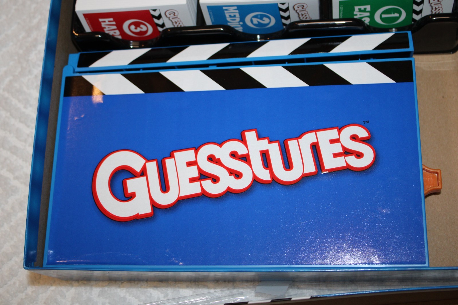 Hasbro Gaming Guesstures Game Charades Game for 4 or More Players Family Party