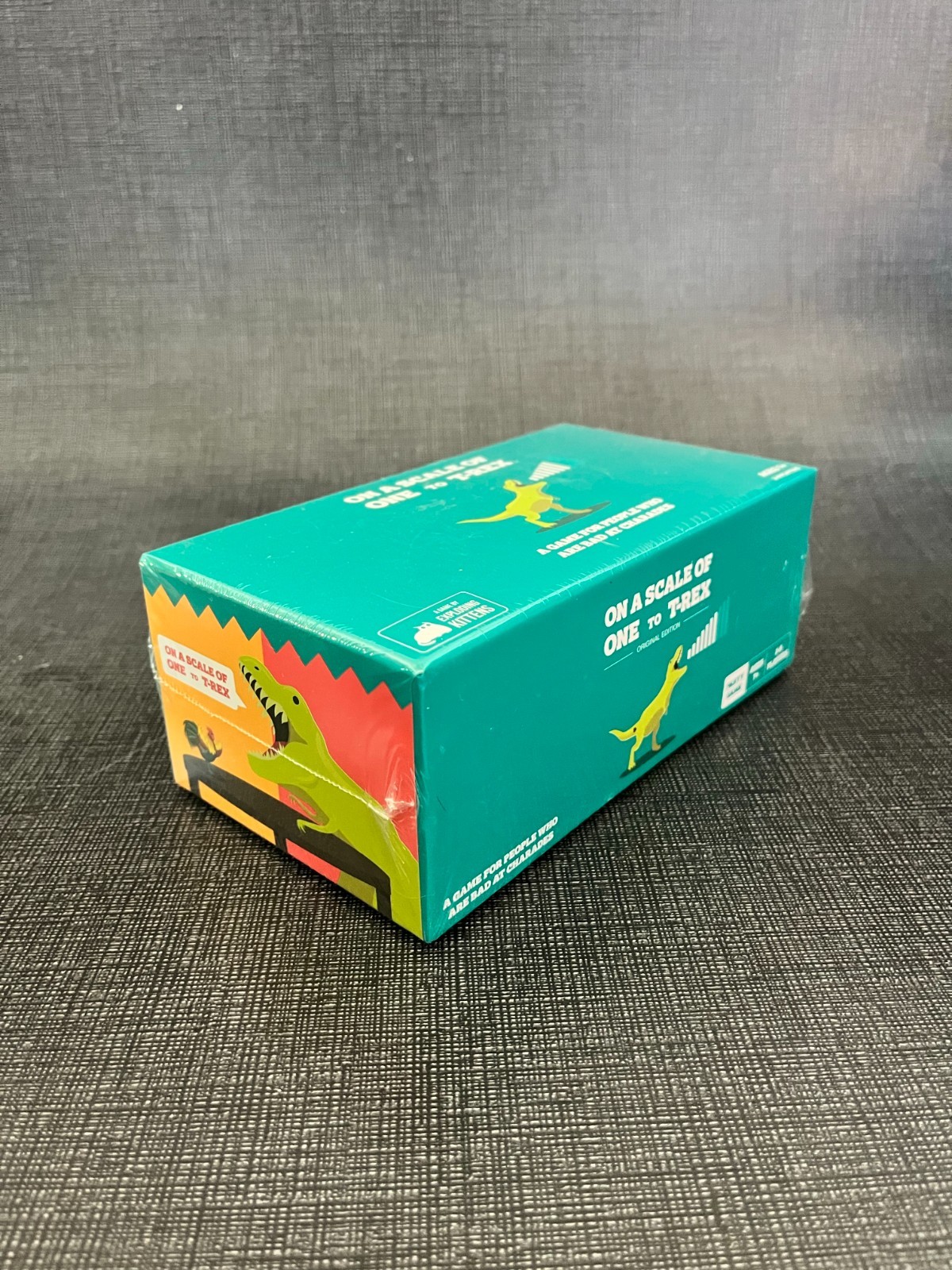 On a Scale of One to T-Rex: Party Charades Card Game for 2-8 Players
