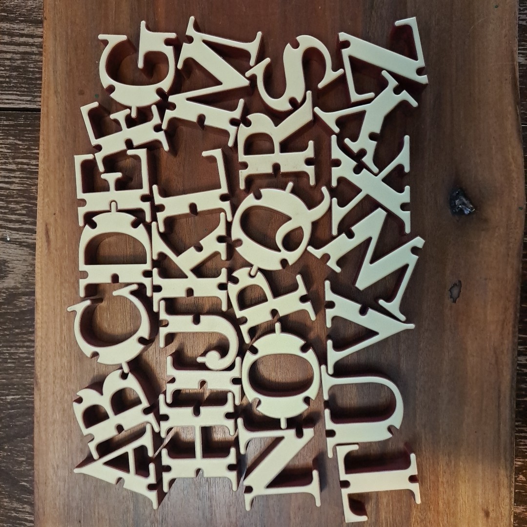 KONEXI The Gravity-defying Word Game by Zamala LETTERS ONLY
