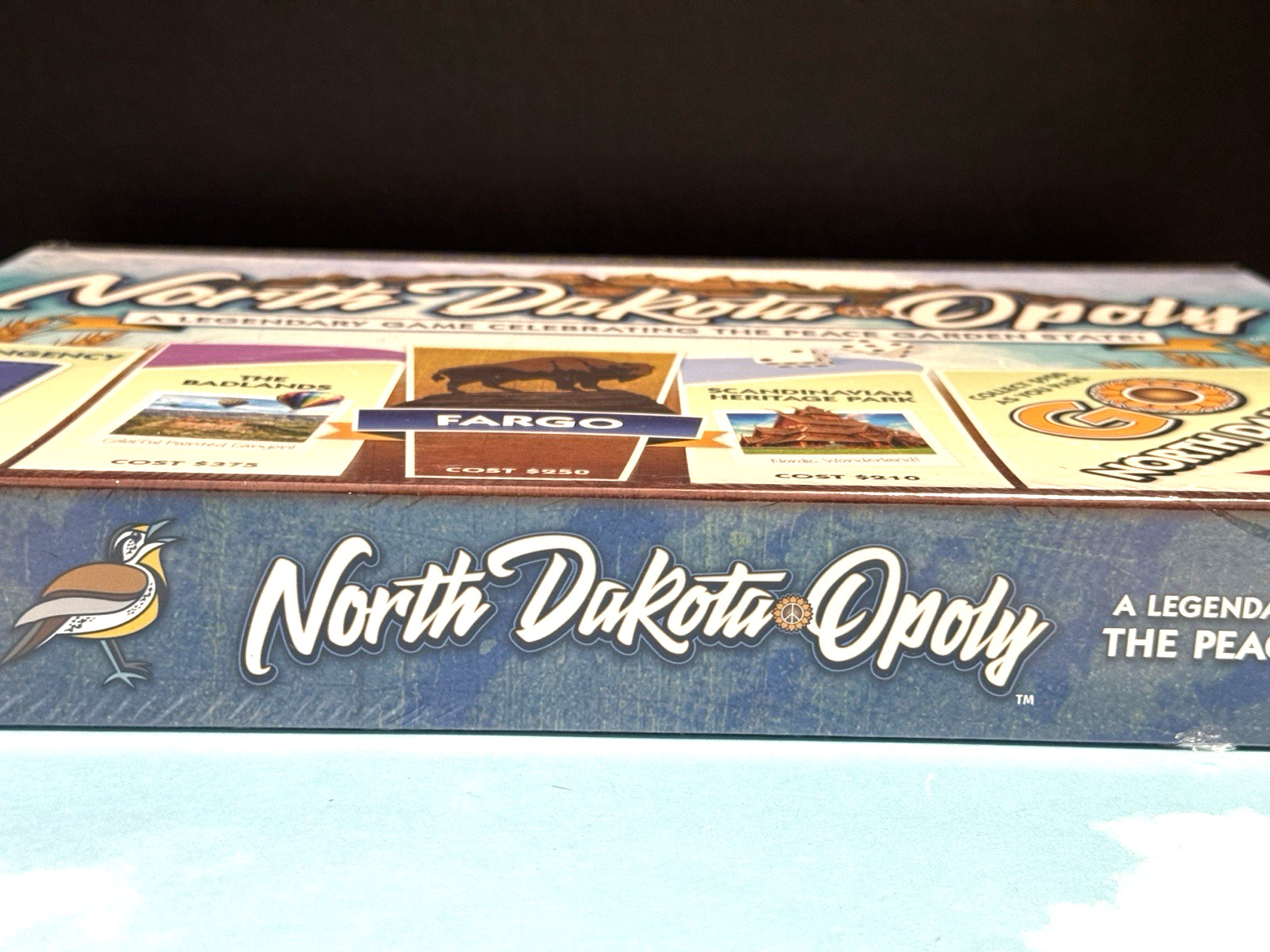 North Dakota-Opoly Monopoly style board Game Celebrating Peace Garden State NEW