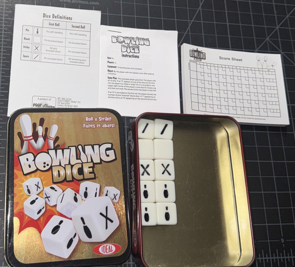 IDEAL Bowling Dice Game – 10 Dice & Score Pad in Tin Container – 2013