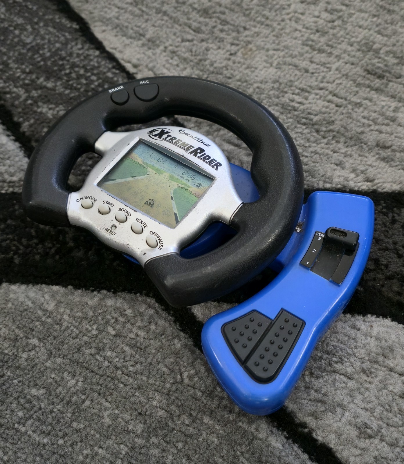 EXCALIBUR Extreme Rider Electronic Handheld Travel Game
