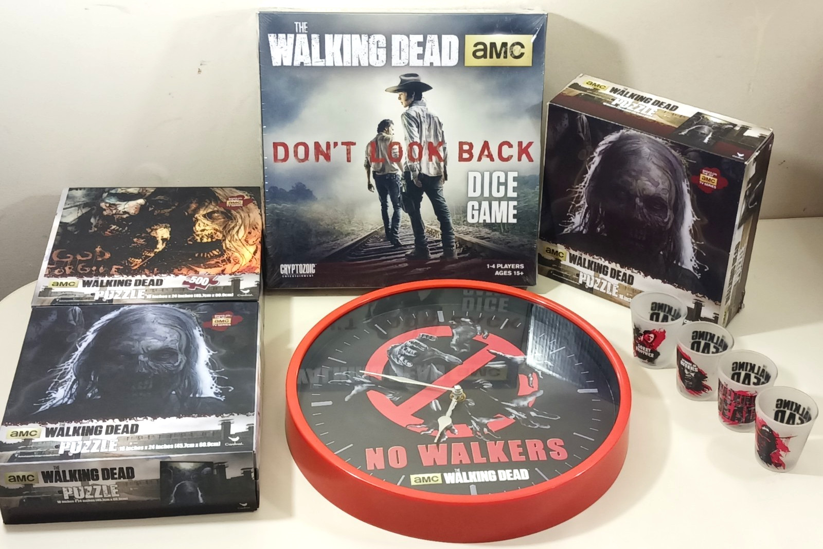 The Walking Dead Lot 4 Shot Glasses 1 Dice Game 3 Jigsaw Puzzles 1 Wall Clock