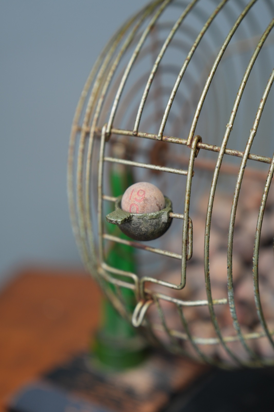 Vintage Metal Bingo Cage Green Bakelite Tower Pillars handle w/ wooden balls