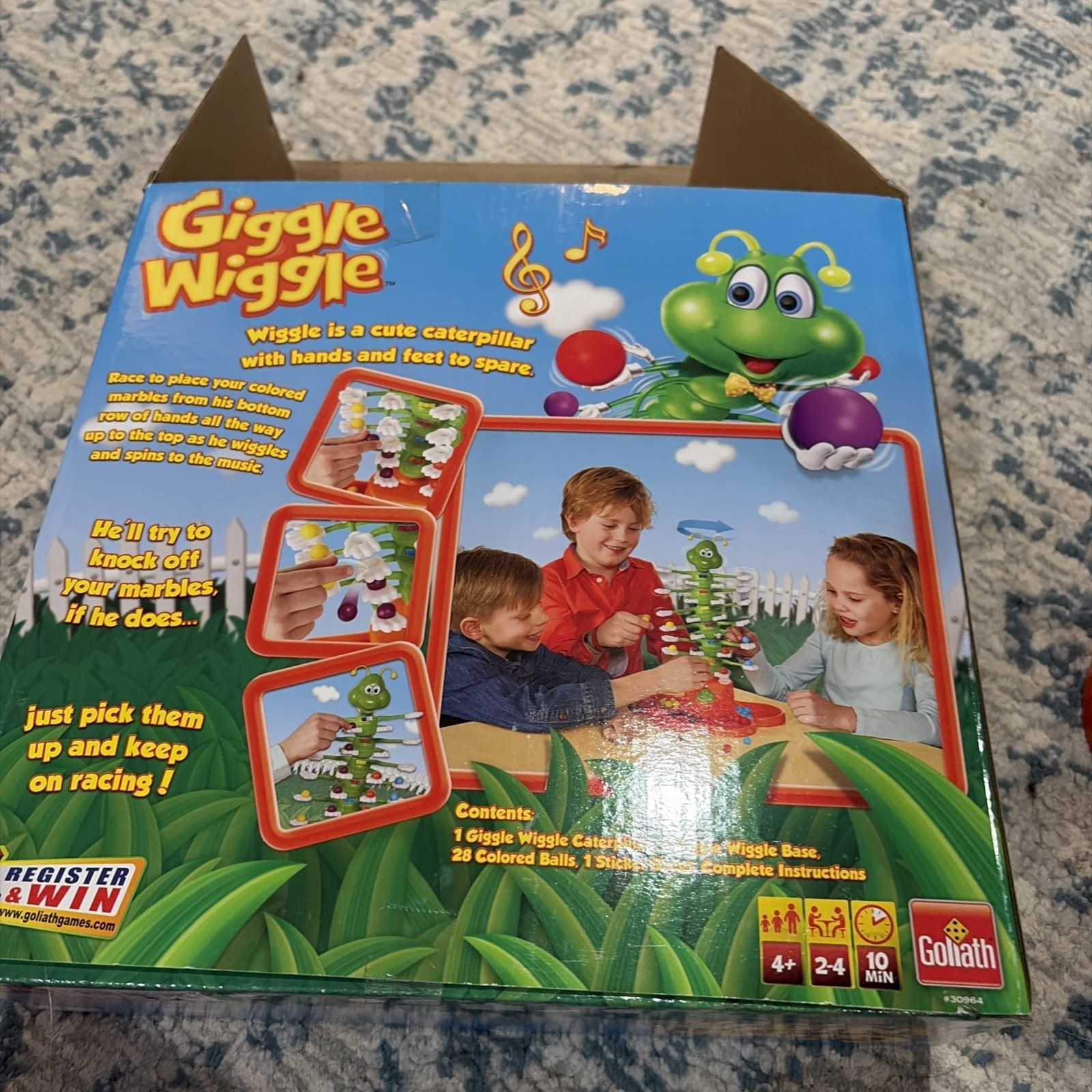 Giggle Wiggle Game Ages 4+ ( 2 to 4 players )