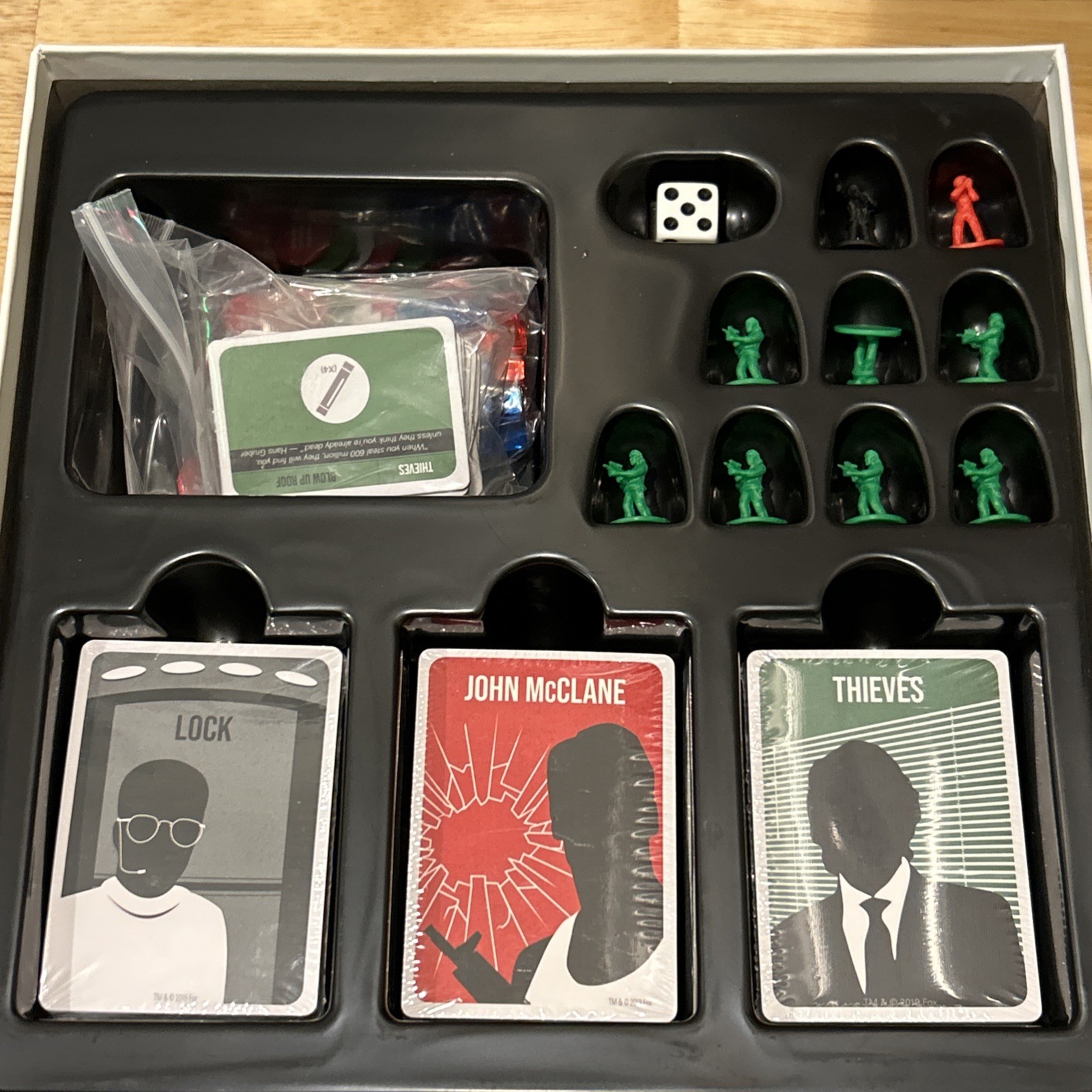 DIE HARD THE NAKATOMI HEIST BOARD GAME OPEN YET UNPLAYED. BRUCE WILLIS CHRISTMAS