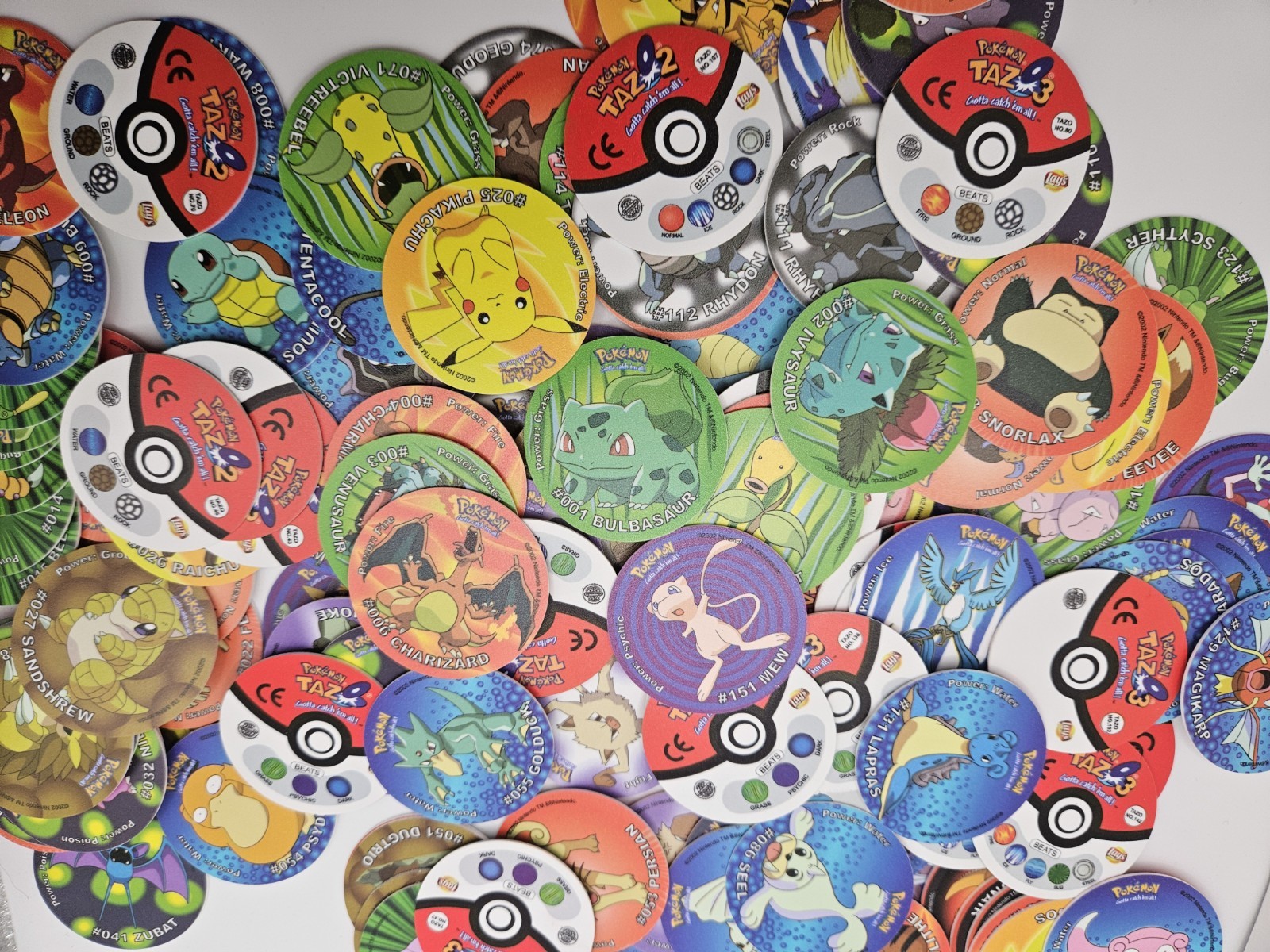 Lot of 500 Random Mix Of 2002 Pokemon Tazos From 1st Generation Pokemon Tazos