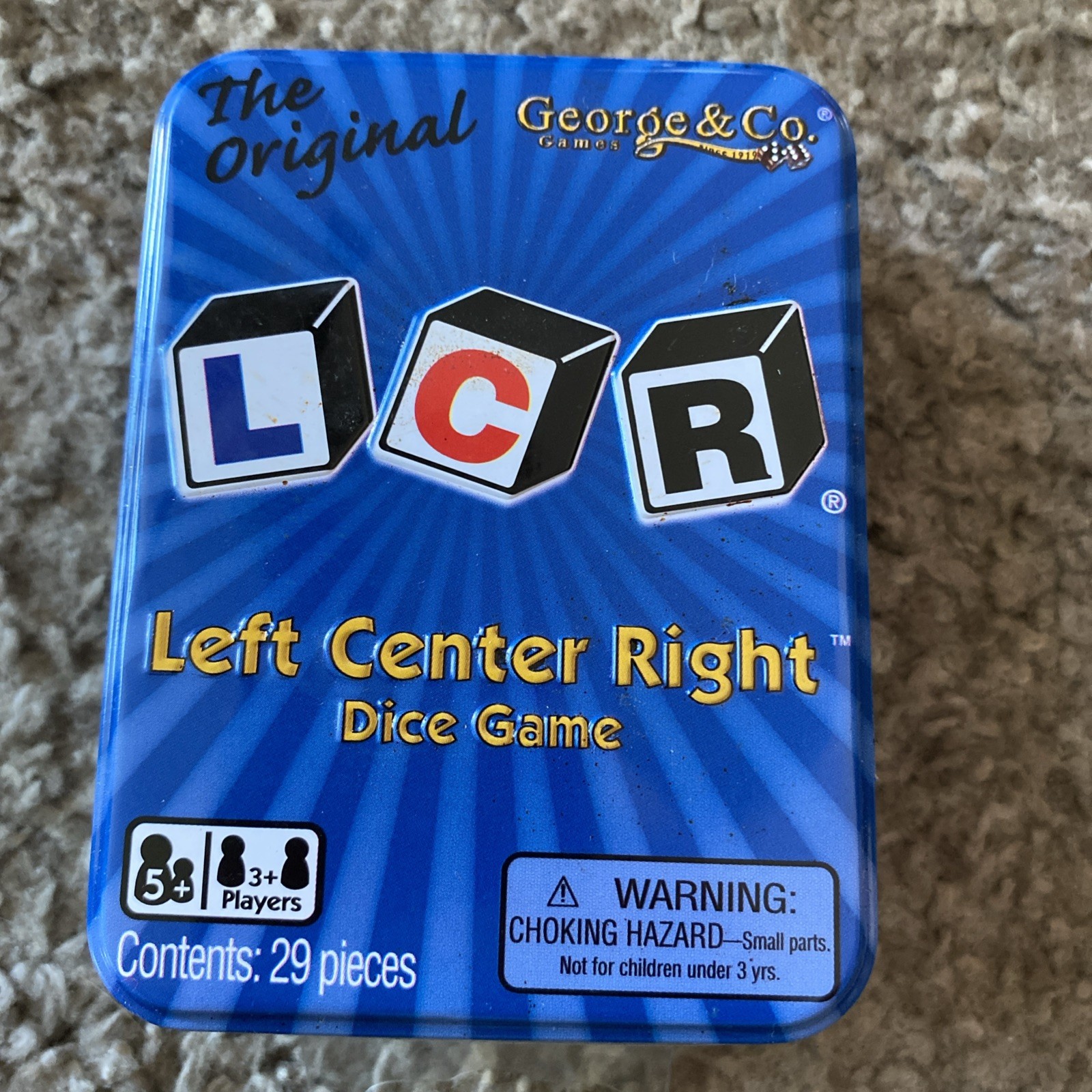 The Original LCR Left Center Right Dice Game Blue Tin NEW