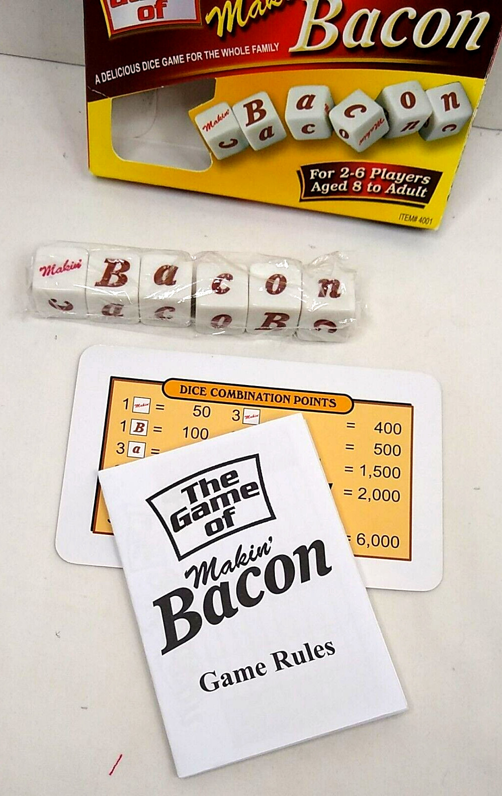 Makin’ Bacon Dice Game 2-6 Players Age 8+ Open box with some flaws