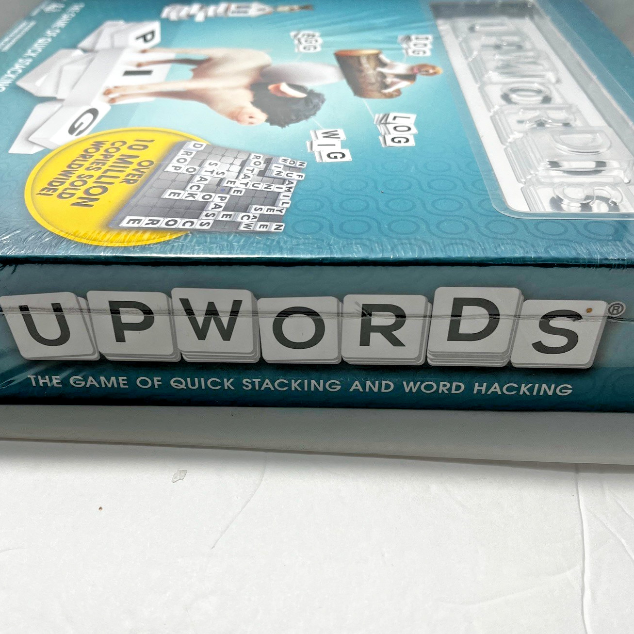 Upwords, The Game of Quick Stacking & Word Hacking with Stackable Letter Tile