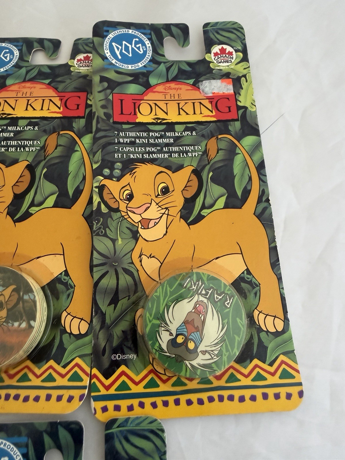 The World Pog Federation Lot of 7 The Lion King Carded Pogs with Slammer New