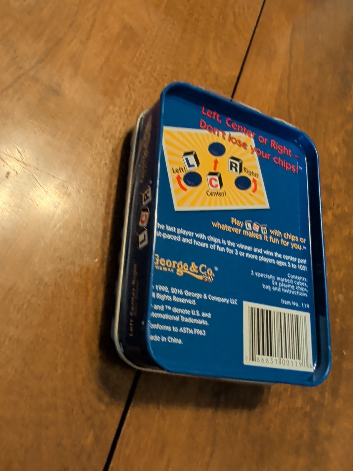 LCR® Left Center Right™ Dice Game – Blue Tin