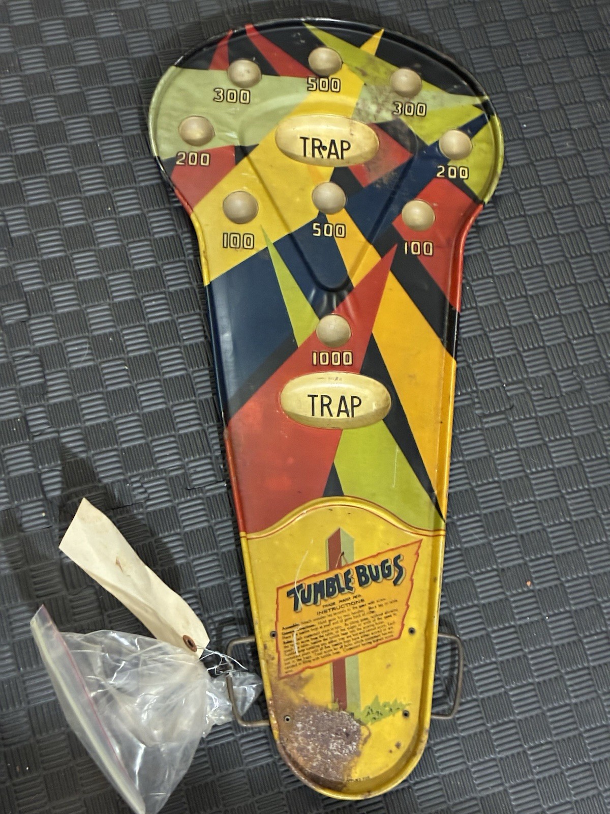 vintage “Tumble Bugs” tabletop game from the early 20th century.