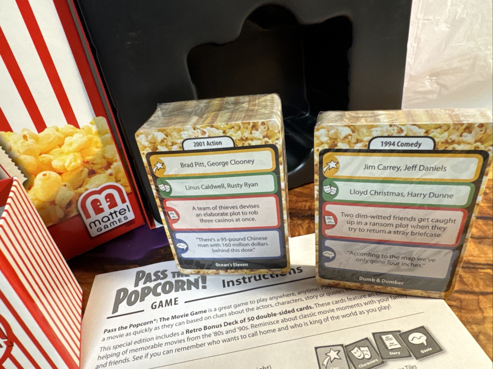 Pass the Popcorn Trivia game. New and complete . Open box.