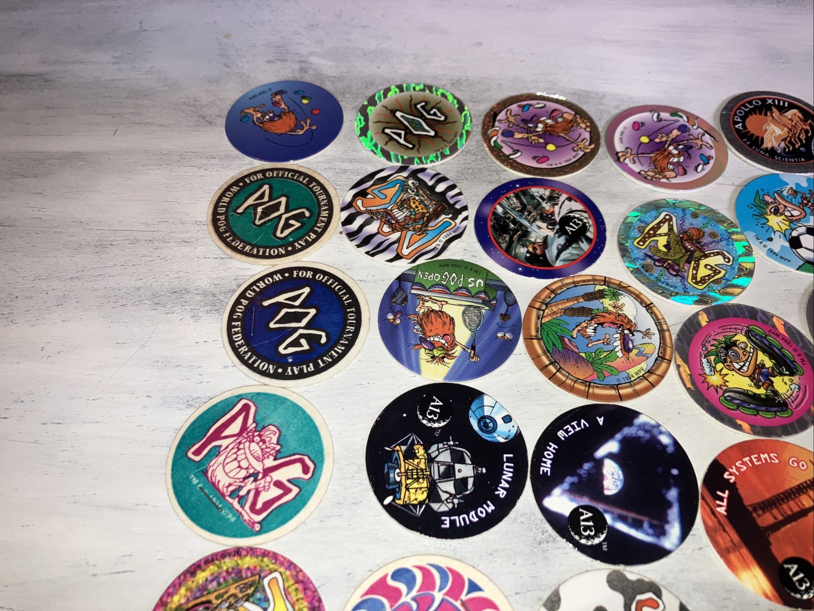 Lot of 34 Pogs from 1994/95 The World Pog Federation Authentic POG Brand WPF