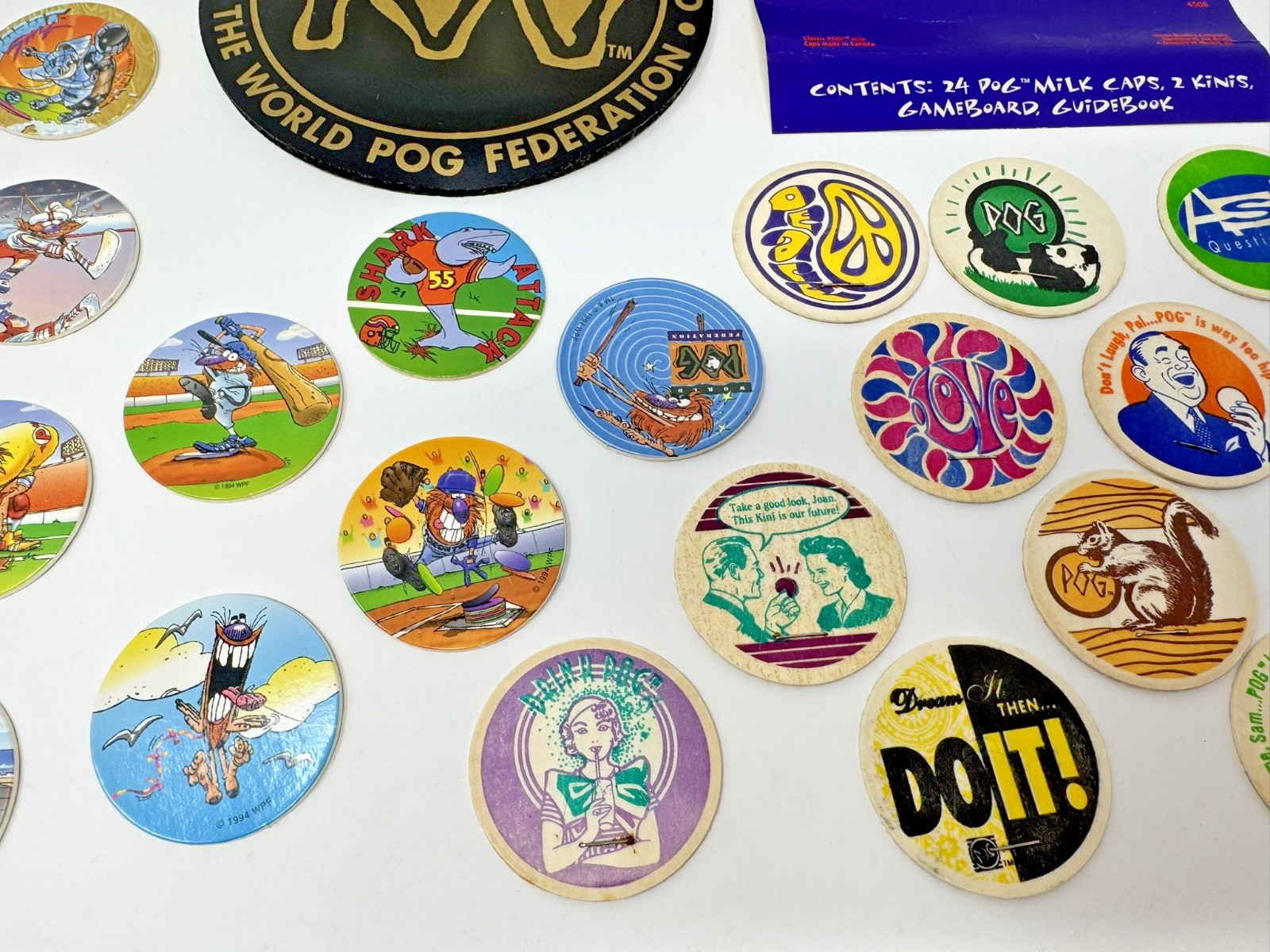 The World POG Federation Micro Tournament Game Pack with 2 Slammers & 25 Pogs