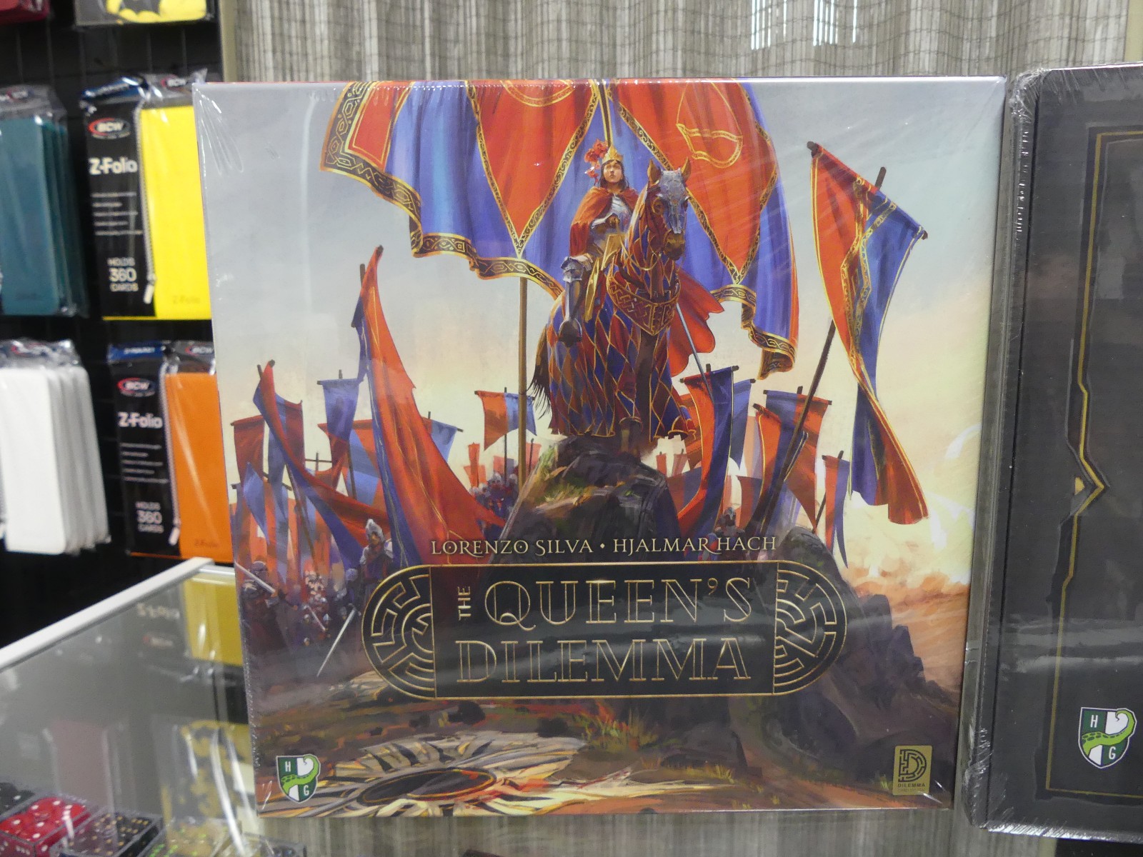 Queen’s Dilemma Boardgame and Recharge Pack Horrible Guild Game Studio