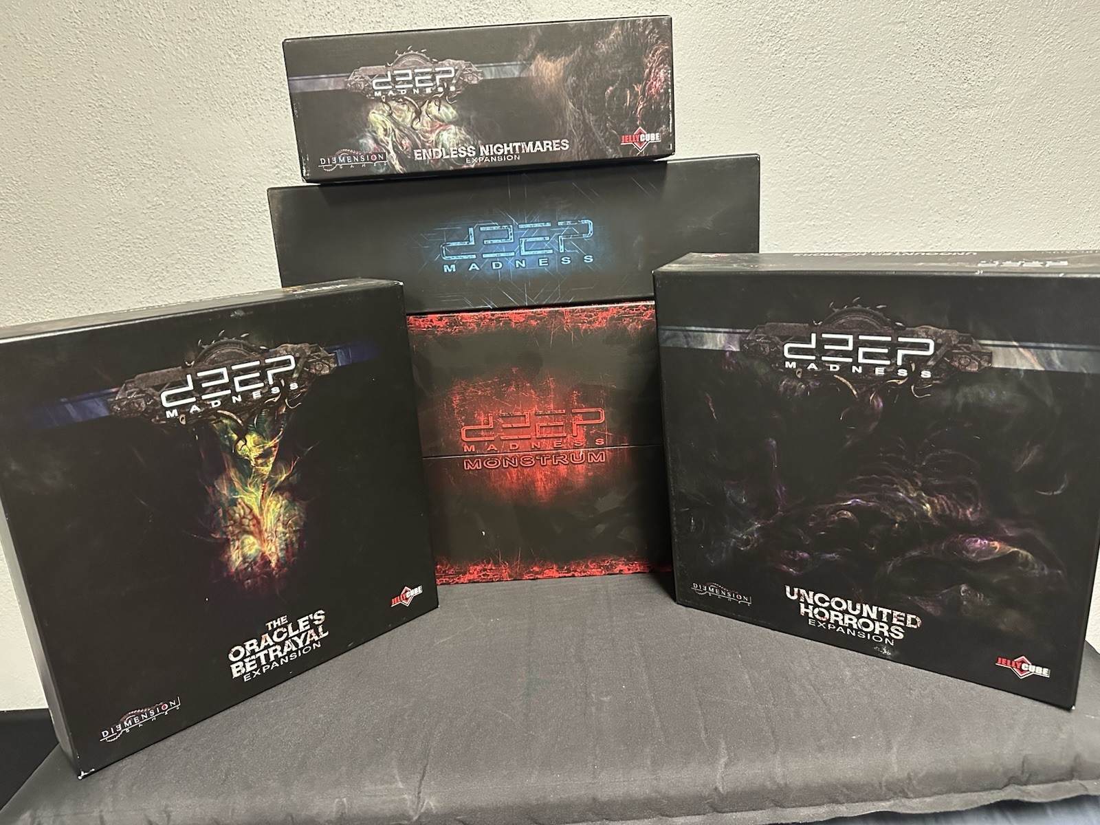 Deep Madness, 5 expansions, Profundum and Monstrum boxes, acrylic packs.