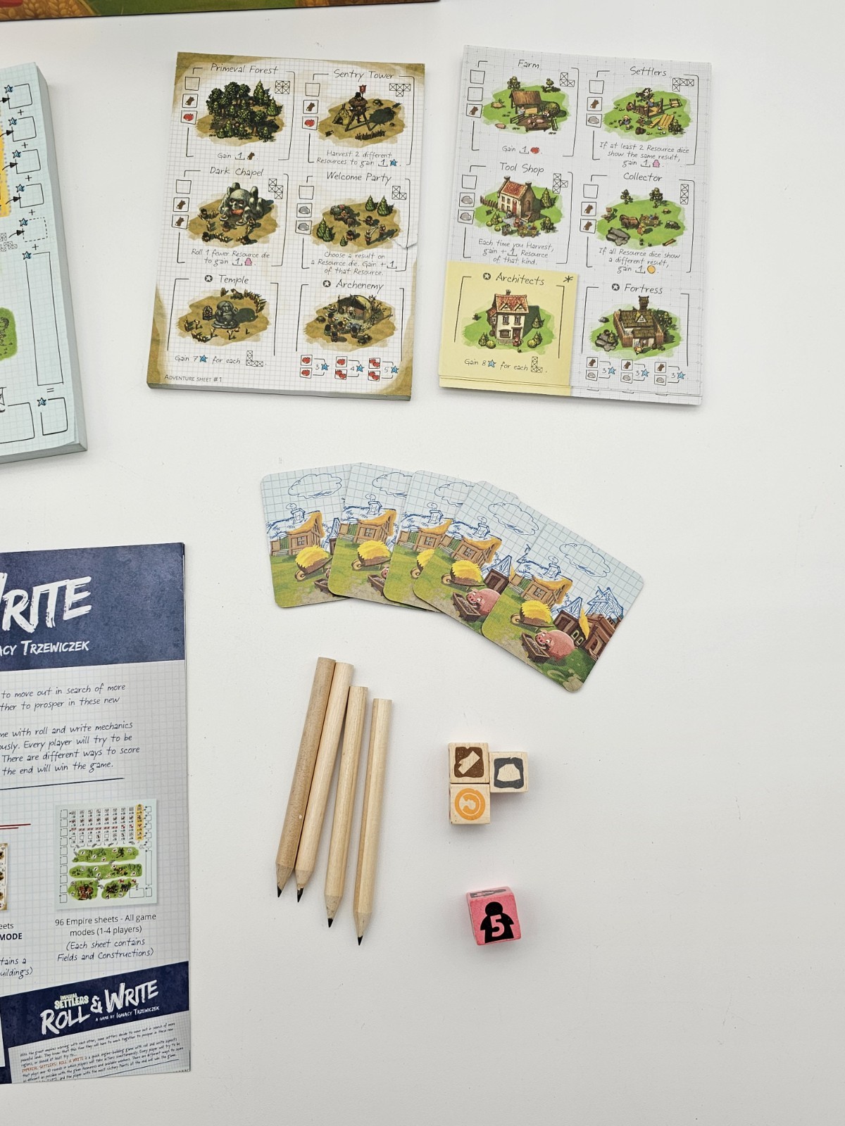 Imperial Settlers Roll & Write board game Build Your New Empire Ignacy Trzwiczek