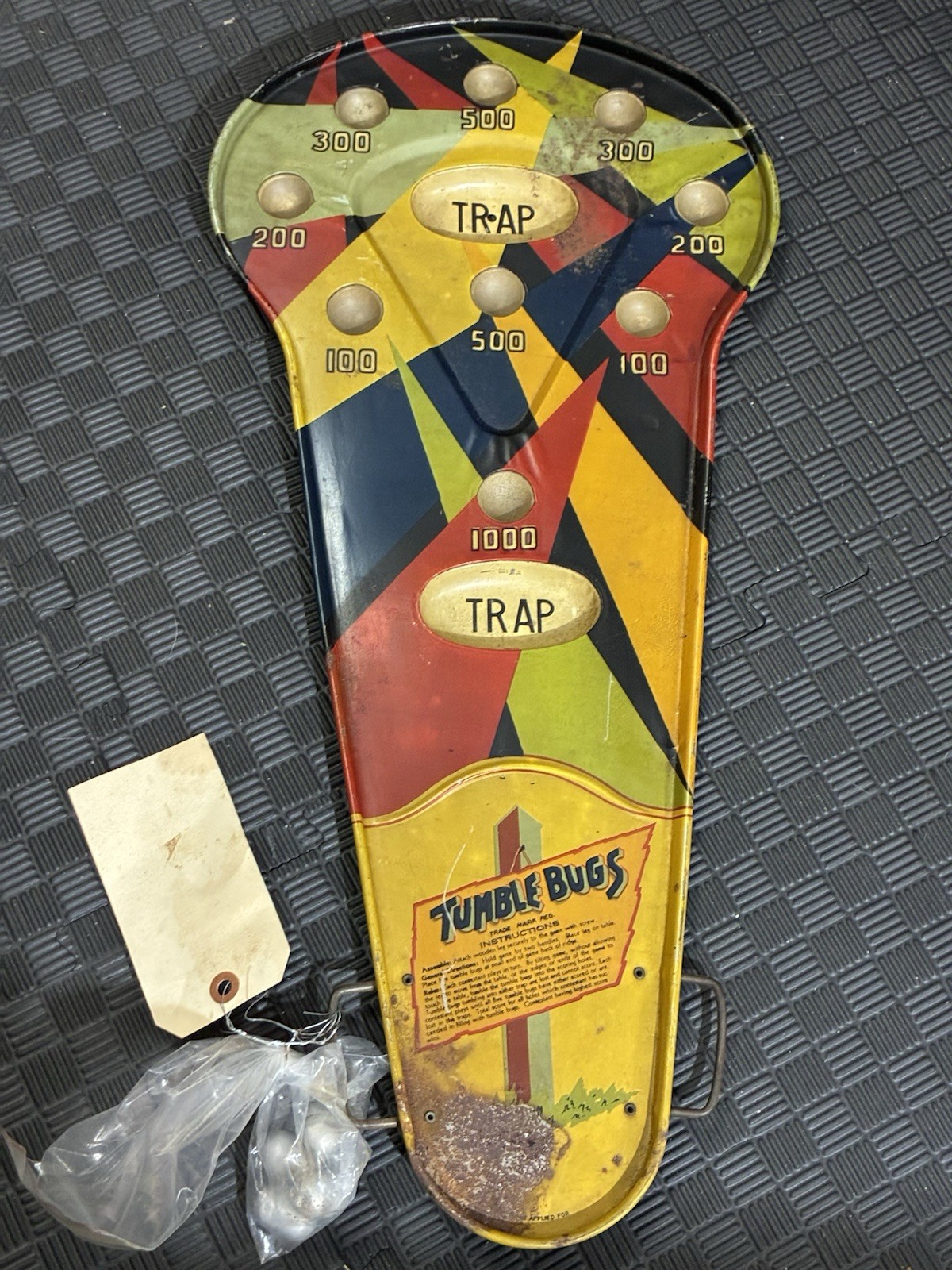 vintage “Tumble Bugs” tabletop game from the early 20th century.