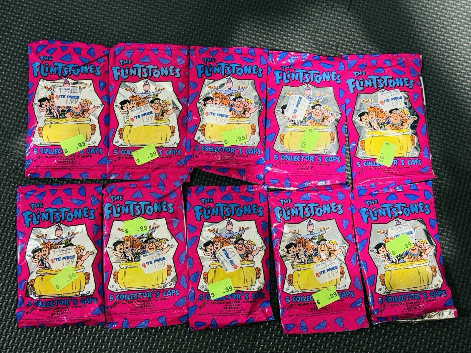 Rare Lot If 10 Packs – 1994 Flinstones Pogs Caps Hanna Barbara